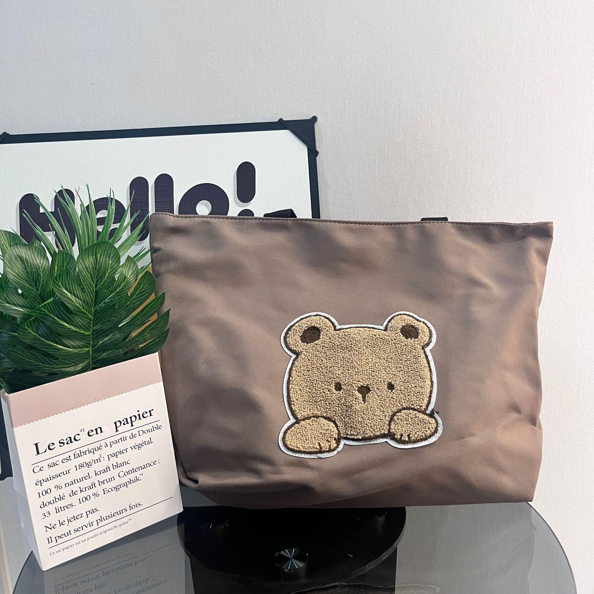 

Morandi Minimalist Large Canvas Bag 45x12x34 cm темно-коричневого кольору