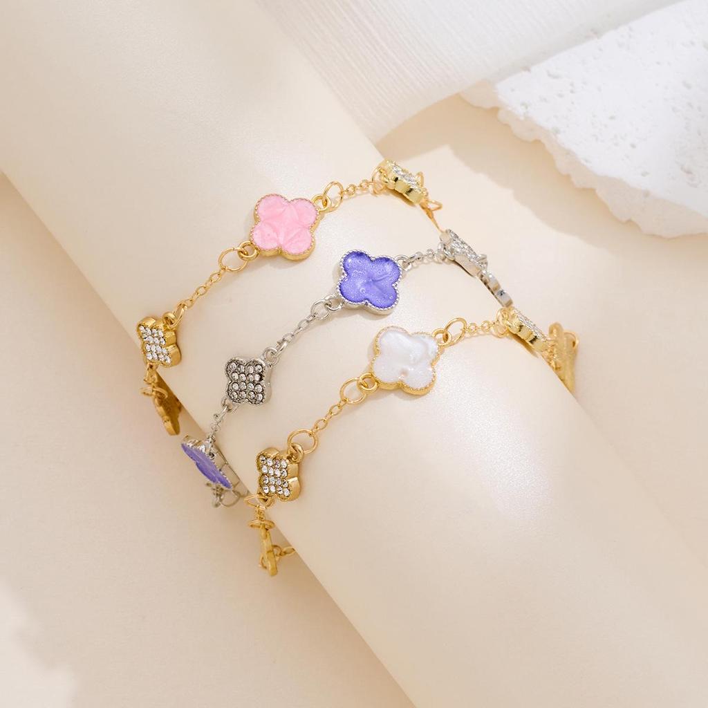 Bransoletka Koniczynka Czterolistna z Cyrkoniami - Elegancki, Luksusowy Niszowy Design