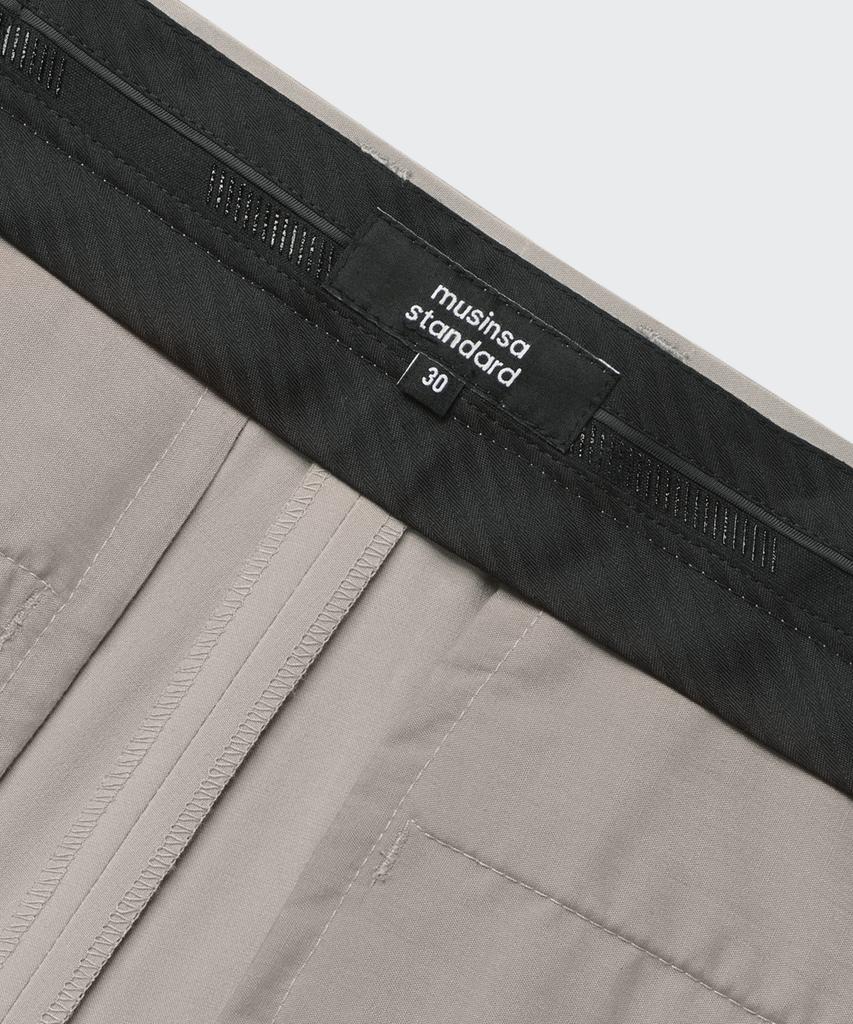 Musinsa Standard [Cooltandard] Relaxed Tapered Hidden Banding Crop Slacks [Light Beige]