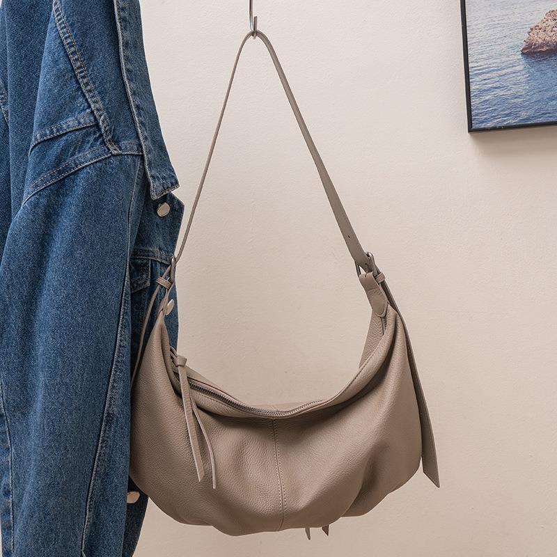 

Women s bag shoulder bag new first-layer cowhide messenger bag women s versatile commuter large-capacity dumpling bag серый