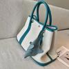 New leather dolphin change bag, keychain pendant, cute fashion earphones, lipstick storage bag.