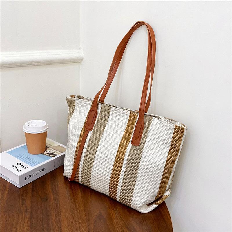 Simple commuting versatile large capacity canvas bag with high aesthetic value single shoulder cloth bag
