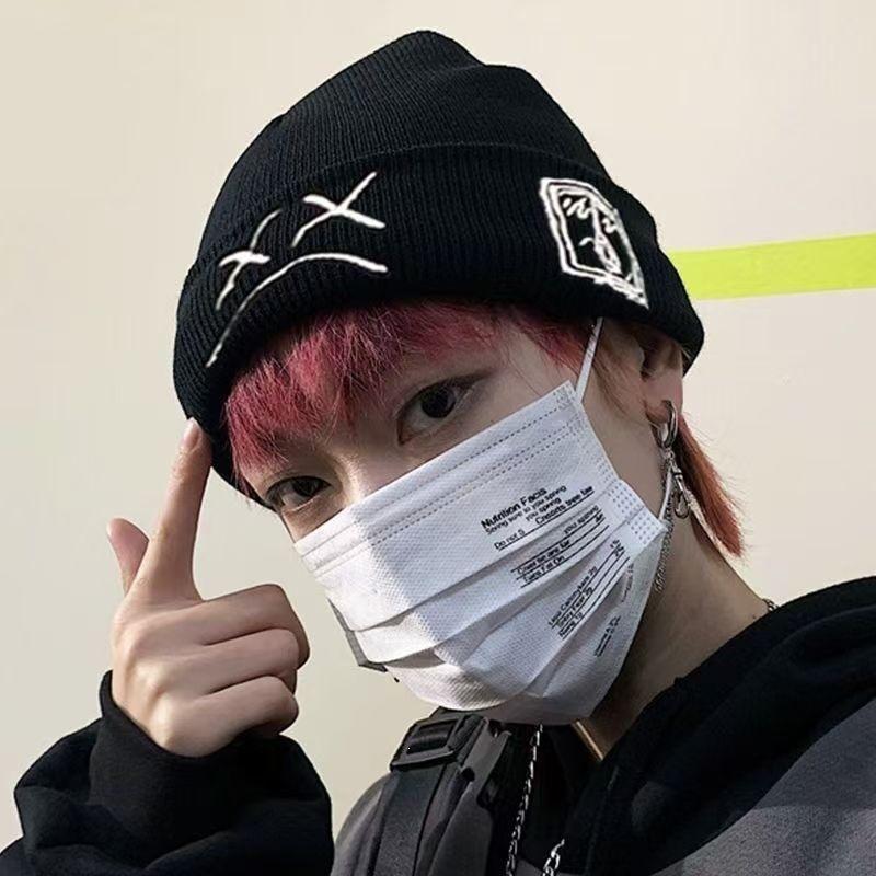 Trendy versatile autumn and winter ear protection puppy hat men's and women's hats knitted wool cold hat embroidery to keep warm