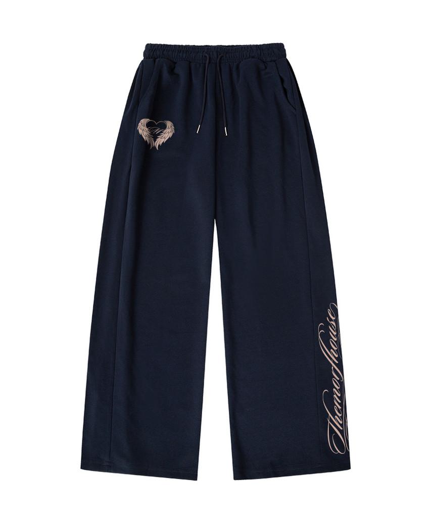 Deomopeuhauseu Wing Morf Lettering Side Pleat Wide Sweatpants Light Blue