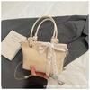 Foreign straw bag women's new high-end texture woven large capacity commuter shopping bag tote beach bag