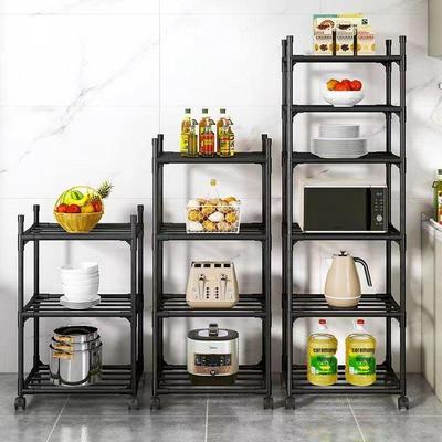 Multifunktionellt köksförvaringsställ: Golvstående flerskiktshylla för förvaring av mikrovågsugn, ugn och skålar.