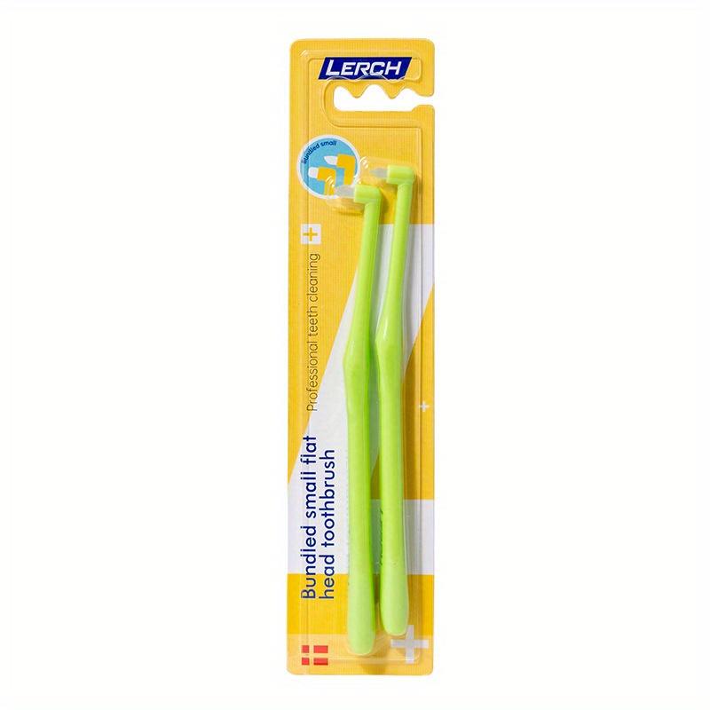 

A Set of Two Soft-Bristled Toothbrushes for Cleaning Between Teeth. зелений