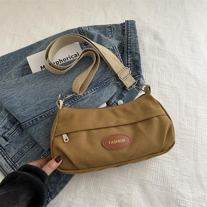 

This year s popular fashion crescent moon dumpling bag 2025 spring and summer new versatile ins shoulder messenger bag going out women s bag коричневый