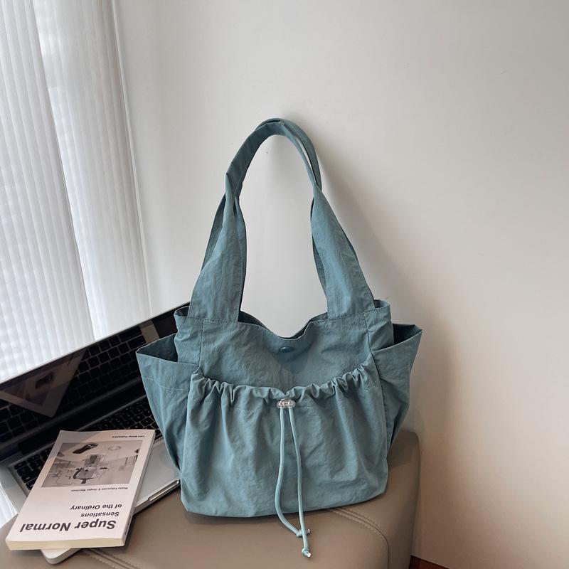 Japanese niche pleated tote bag women's large capacity 2025 summer new fashion simple casual commuter shoulder bag