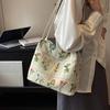 Borsa a tracolla ricamata di grande capacità Borsa estiva alla moda in tessuto da donna Borsa a tracolla con ricamo di nicchia Borsa a secchiello con texture Borse in tela
