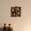 Lord Ganesha on Om Swastik Metal Wall Hanging (22.86 cm x 2.54 cm x 23.87 cm, Brown)