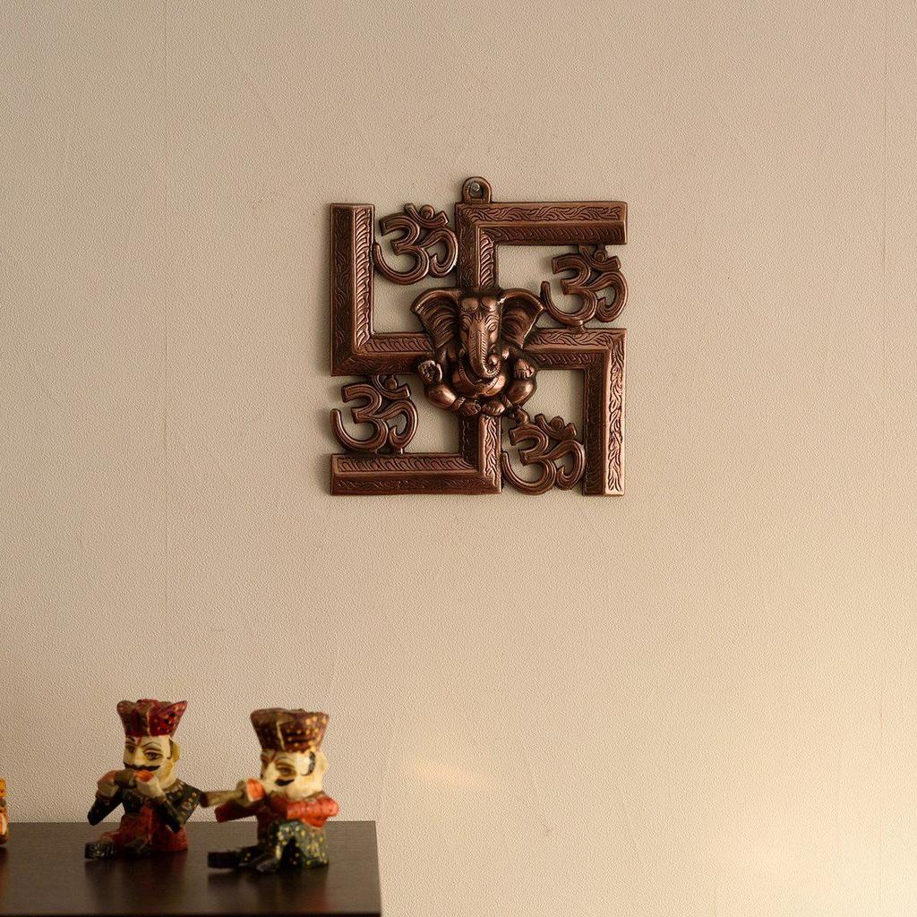 Lord Ganesha on Om Swastik Metal Wall Hanging (22.86 cm x 2.54 cm x 23.87 cm, Brown)