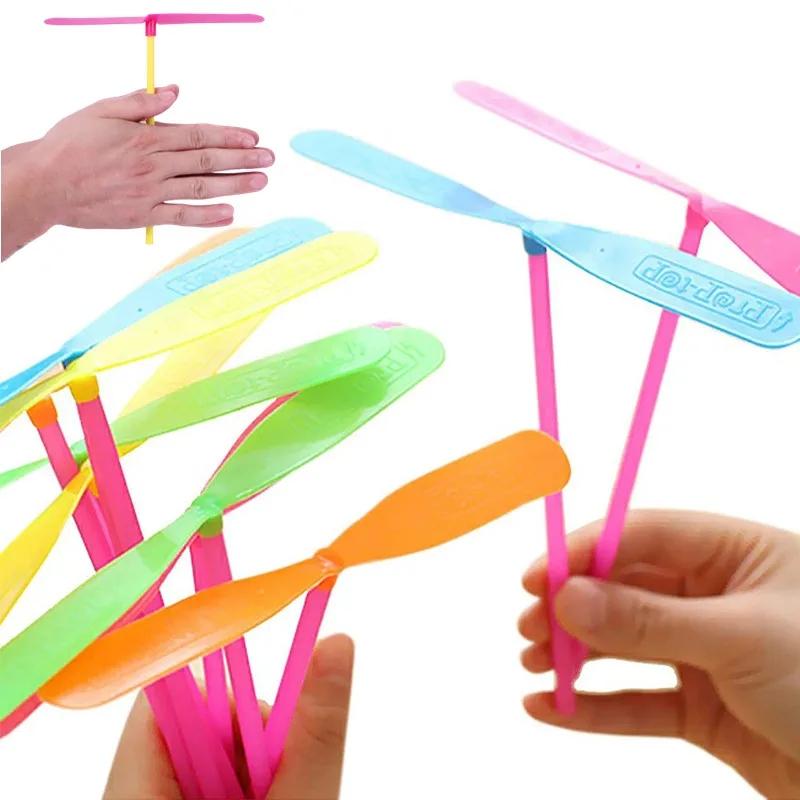 96Pcs Plastic Bamboo Dragonfly Shape Hand Push Flying Propeller Outdoor Sports Game Kids Toy Gift Rotating Flying Arrow Games
