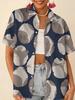 Gentle blue floral printed shirt for women, short-sleeve loose lapel design, niche vacation style top