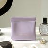 Portable Makeup Bag with Lipstick, Data Cable, Bluetooth Headset, Charger, and Key Storage; Automatic Closure Spring Sheet Design