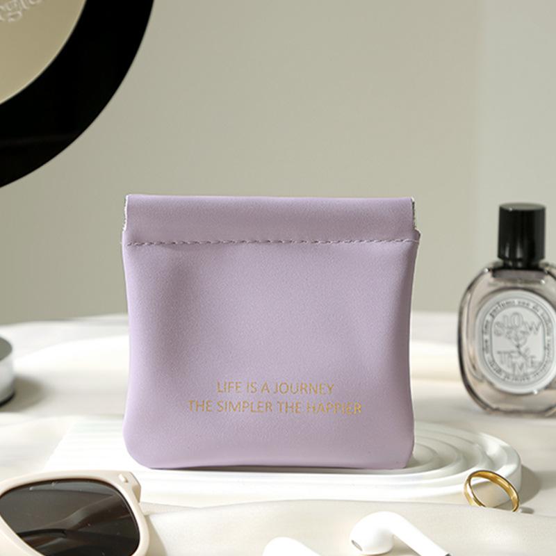 Portable Makeup Bag with Lipstick, Data Cable, Bluetooth Headset, Charger, and Key Storage; Automatic Closure Spring Sheet Design