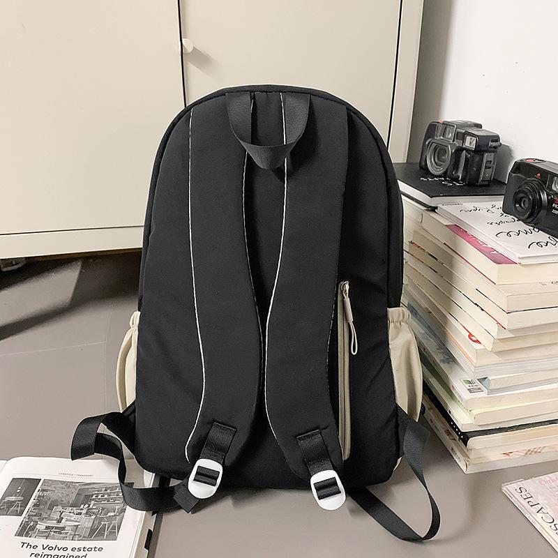 2025 new men's and women's backpacks, large-capacity multi-functional fashion backpacks, waterproof schoolbags for junior high school students, women