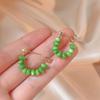 Retro Light Luxury Green Cat's Eye Stone Earrings - Niche Design, High Quality