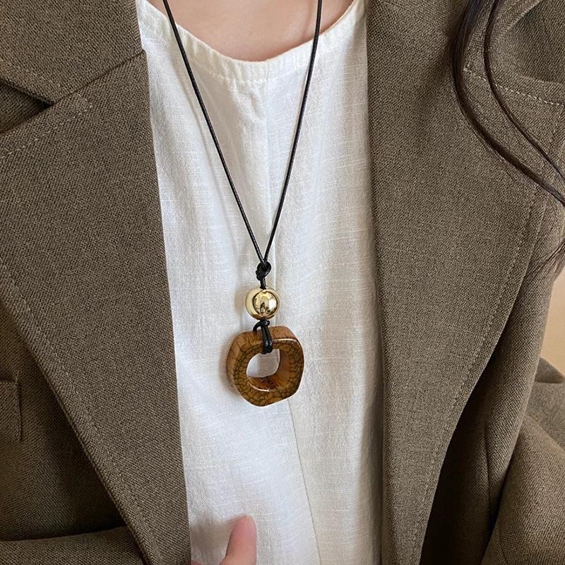 Faux Camel Bone Pendant Necklace - Women's Autumn/Winter Long Sweater Chain, Niche Design, Versatile Accessory