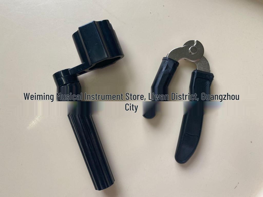 Bakelite Multi-Functional Guitar Tool: String Winder, Pin Puller, Pin Remover, and String Cutter.