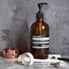 Nordic Style Refillable Glass Bottles for Hand Sanitizer, Soap, Shampoo, and Bathroom Accessories Photography.