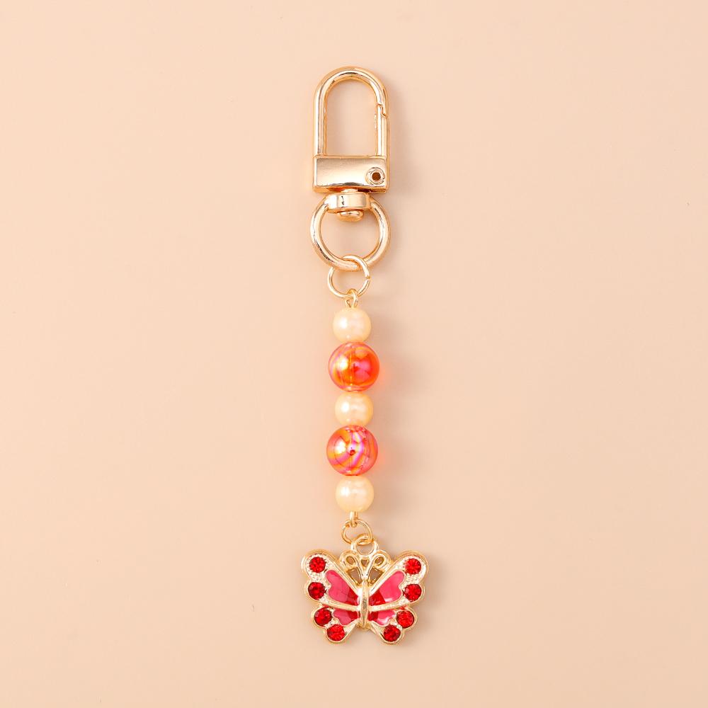 

Cute Enamel Flower Butterfly Keychain Women Girls Beads Pearl Key Ring Pendants for Handbag Decor DIY Handmade Jewelry Gifts