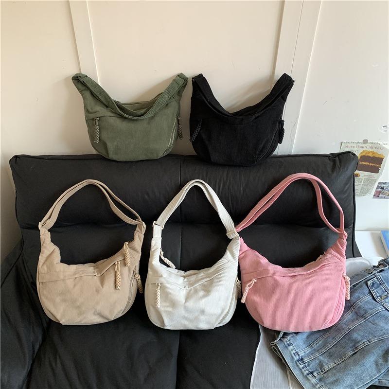 Spring new simple large-capacity messenger bag female student small satchel sports versatile backpack dumpling bag