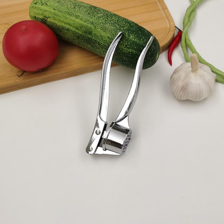 Stainless Steel Manual Garlic Press & Peeler: Mincer, Masher, Squeezer for Kitchen Use