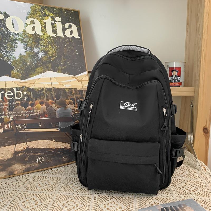 

New schoolbag female college student solid color large-capacity backpack multi-layer strong middle and high school student backpack Single Pack