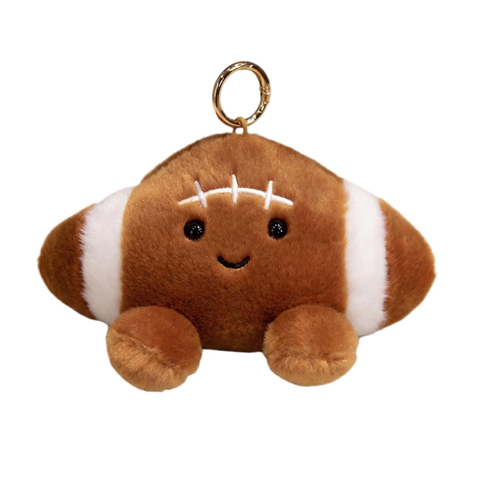 

Plush Football Keychain Soft Stuffed Toy Hanging Accessory for Bags Backpacks and Keys 12cm Size with Metal Ring Attachment One Size