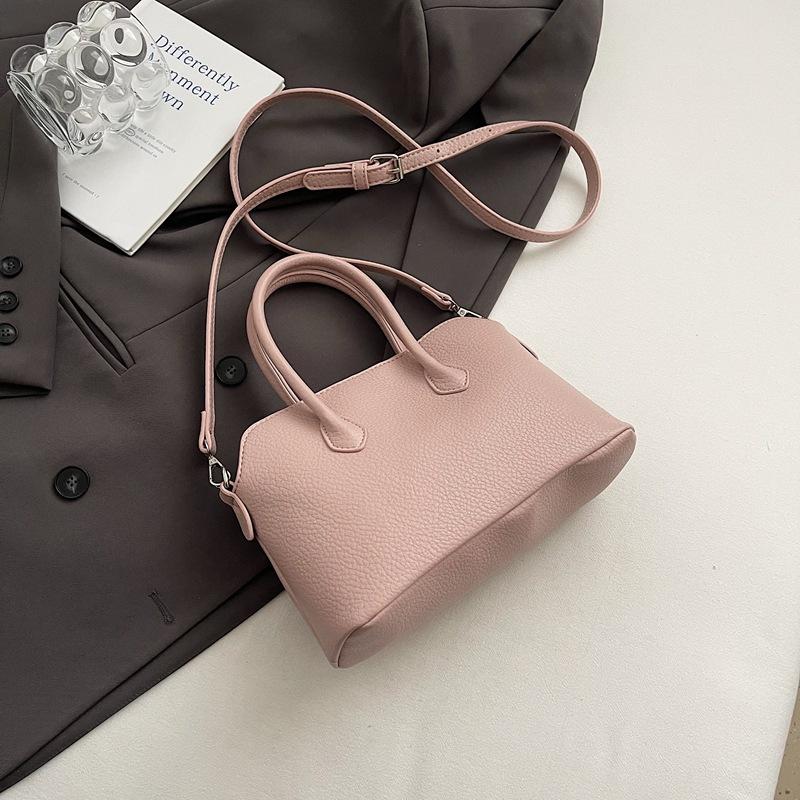 Simple temperament hand bag women's spring new niche fashion messenger bag commuter shoulder bag
