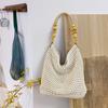 Spring new seaside beach bag women's large-capacity hollow woven shoulder bag versatile portable tote bag