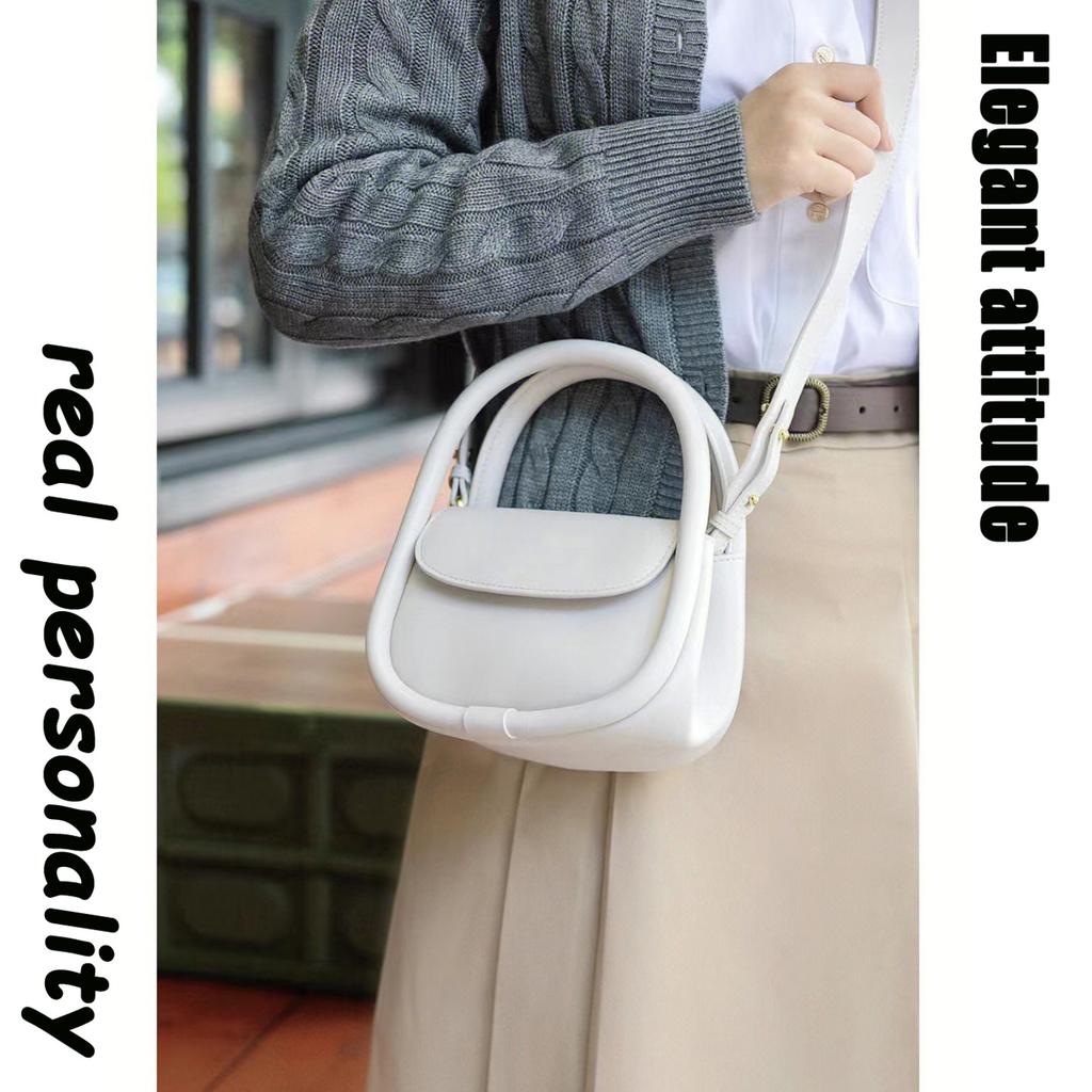 Summer fresh min handbag hand carry trendy versatile messenger bag high sense leather soft European bag niche bag