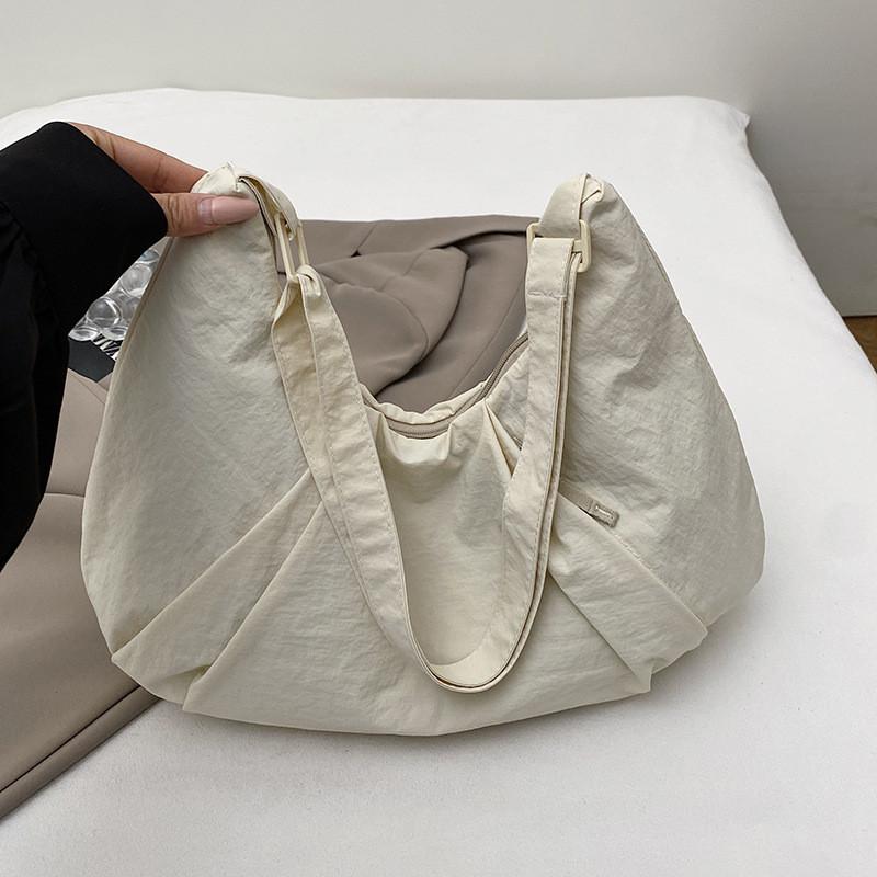 Bolso cruzado de nailon estilo callejero con cierre de cremallera para uso diario