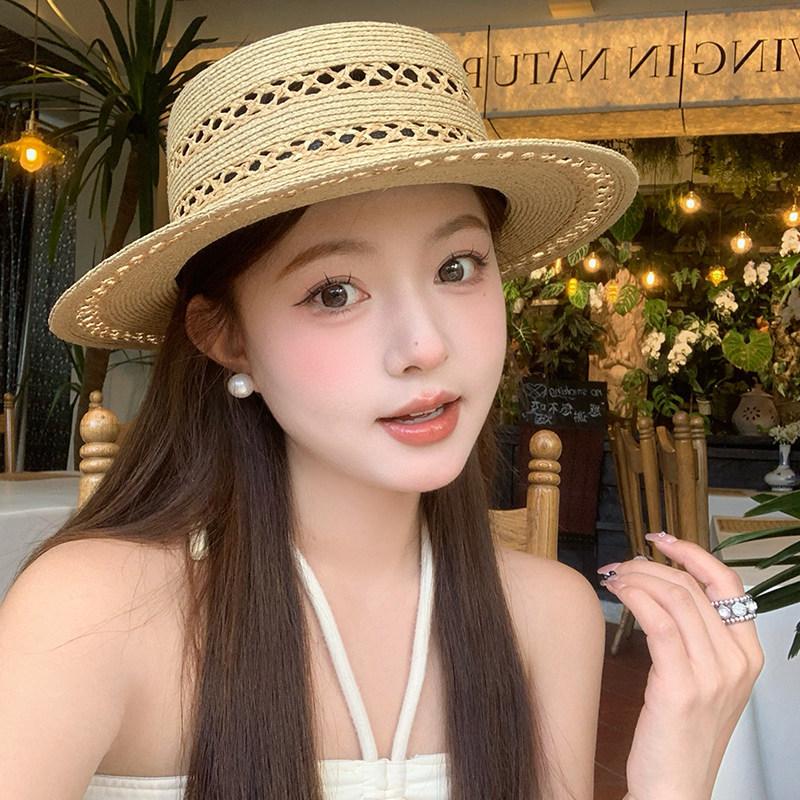 Hand-woven flat-top Lafite straw hat women's summer new hat hollow sunshade sunscreen hat French top hat
