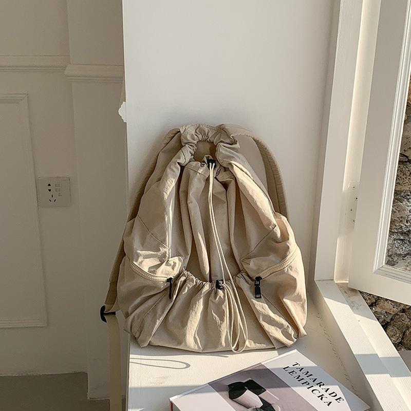 Zaino da donna con coulisse, plissettato, leggero, casual, borsa da scuola, grande capacità, zaino alla moda in nylon per donne