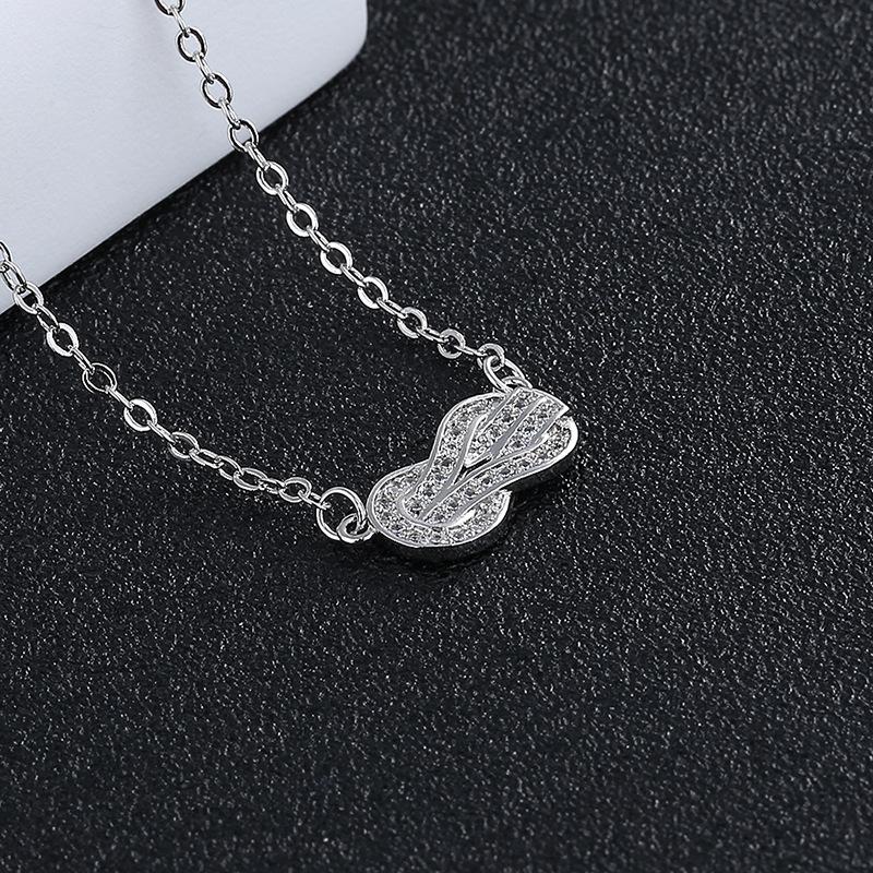 Korean version of fashion temperament rotating peanut bean necklace women's niche design chain versatile jewelry