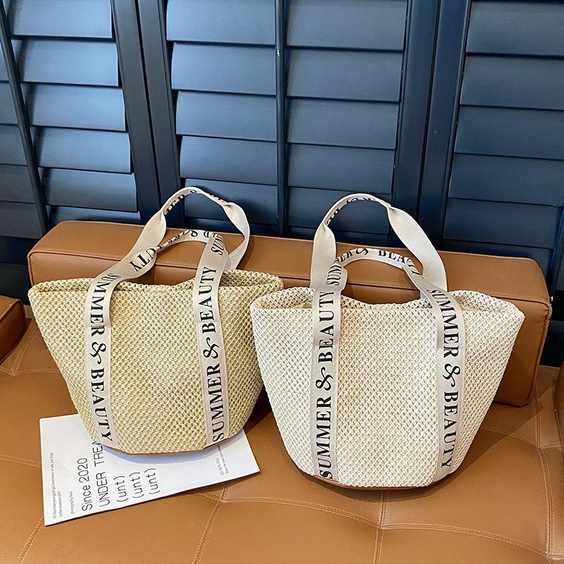 Woven straw bag women's large capacity 2 new spring and summer versatile shoulder beach bag commuter bucket bag