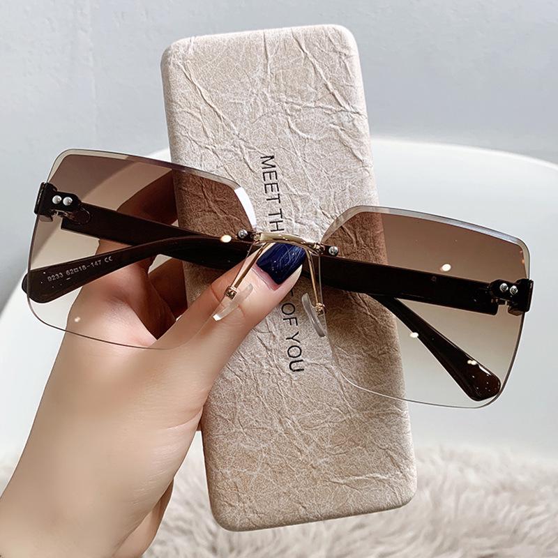 Korean Style Frameless Women's Sunglasses: Trendy, Big Face Slimming, UV Protection, Perfect for Summer and Internet Celebrities.