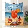A Vibrant Aperol Spritz with Beach Chairs, Ocean, and Seagulls. for All Seasons Blanket Lunch Break Throw Gift