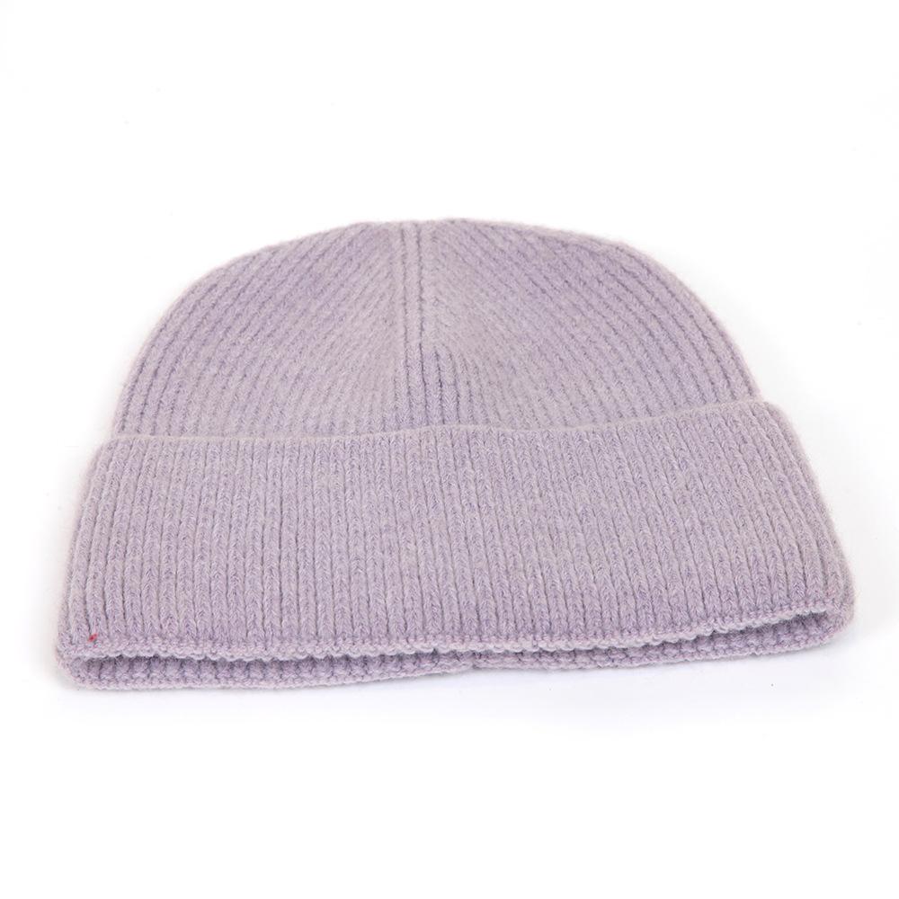 Wool hat women's autumn and winter simple solid color warm hemming thickened pullover cold hat men's knitted hat