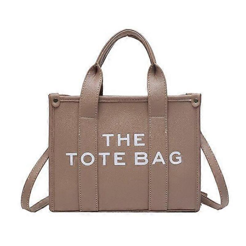 Damernas crossbody-väska med en 120 cm axelrem, som väger 0,6 kg, har stor kapacitet och är lätt att öppna och stänga.