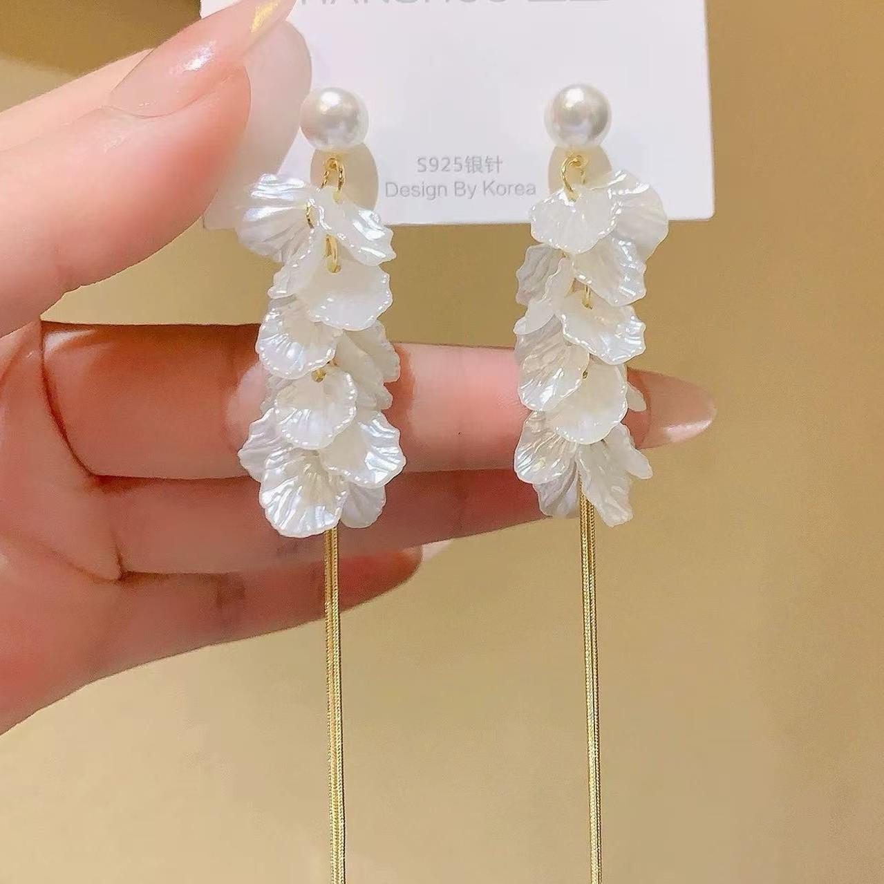 

French elegant romantic petal fringed stud earrings for women s summer fresh wind with the same trendy temperament earrings