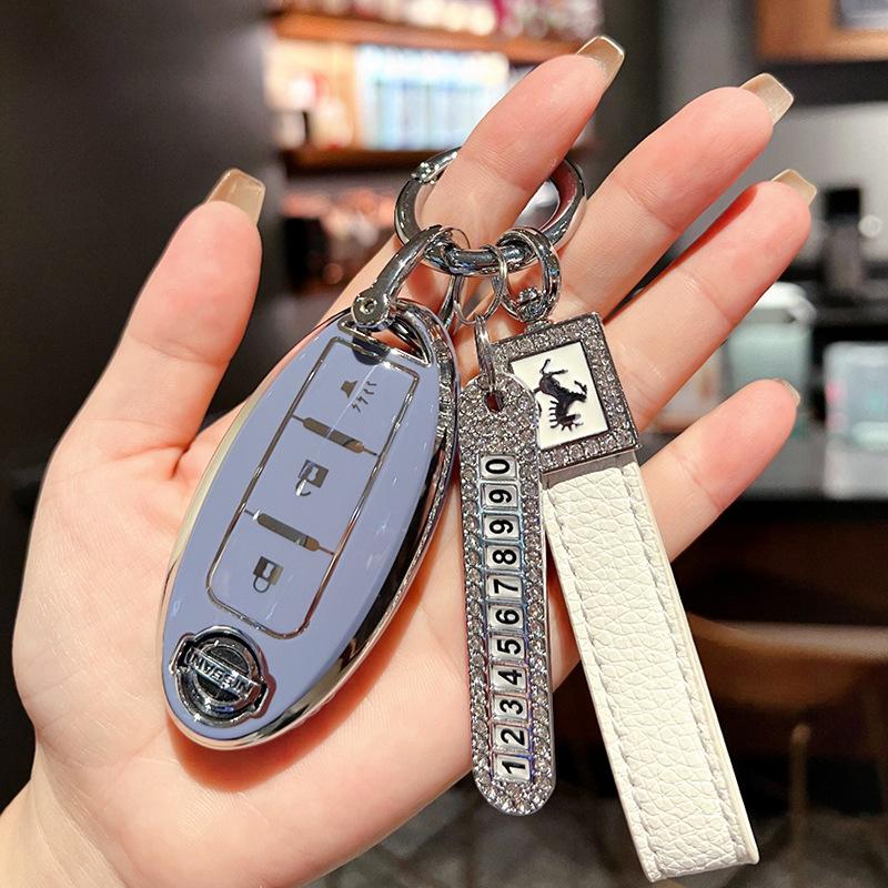 Applicable to Nissan key set 14th generation Xuanyi Bluebird Teana Sunshine Qijun Nissan Tiida bag buckle case Auto supplies