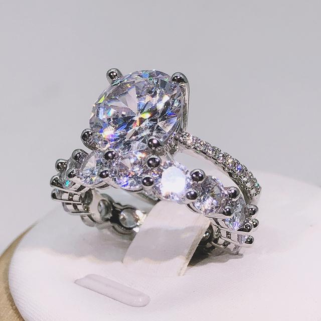 

Высокое качество, классические роскошные белые ювелирные изделия с цирконом, стерлинговое серебро 925 пробы, круглая огранка, 5а, Cz, обручальное кольцо с короной, комплект, Прямая доставка 7 белый