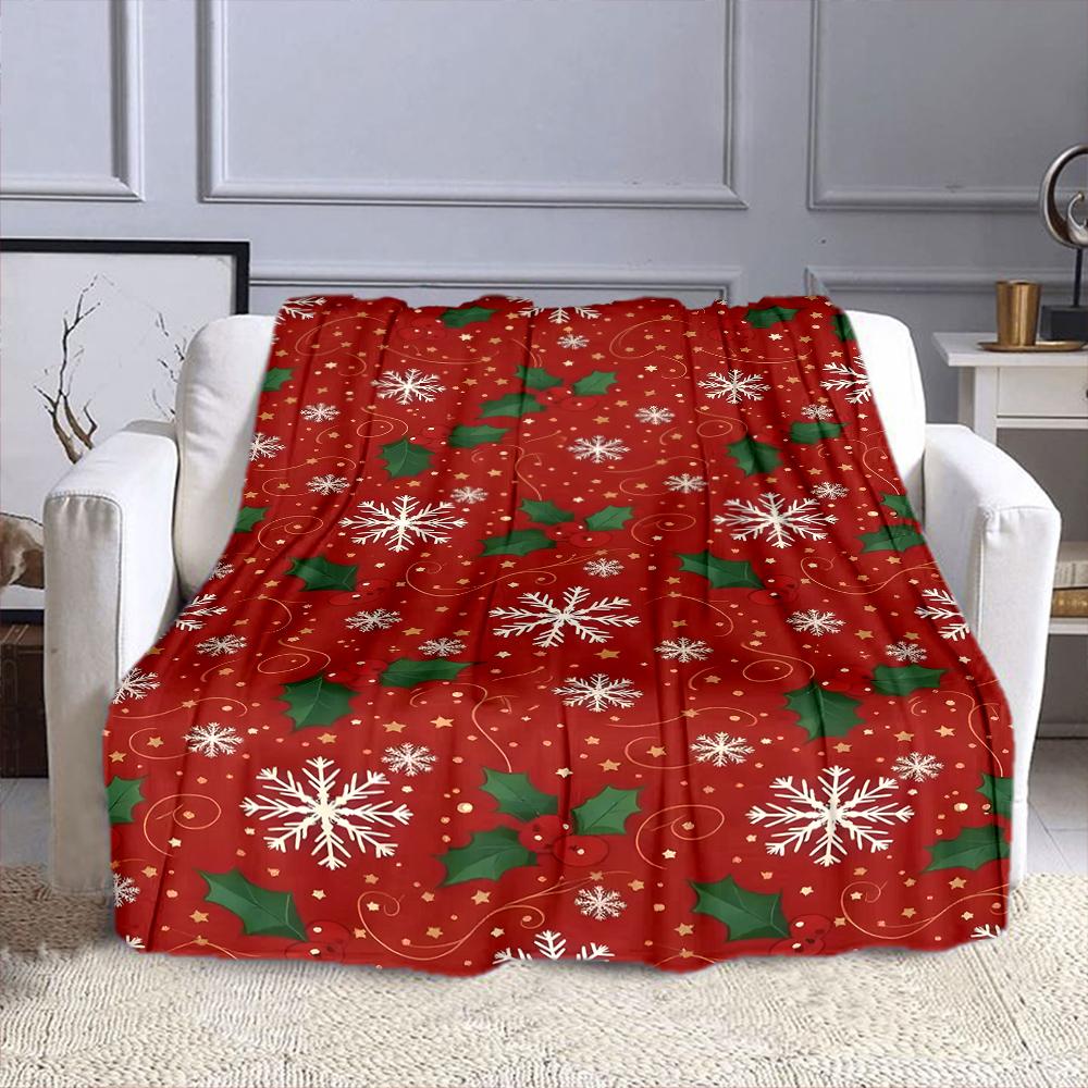 Festive Holly and Snowflake Pattern Patterned flannel blanket perfect for the bedroom living room, sofa, or a little nap