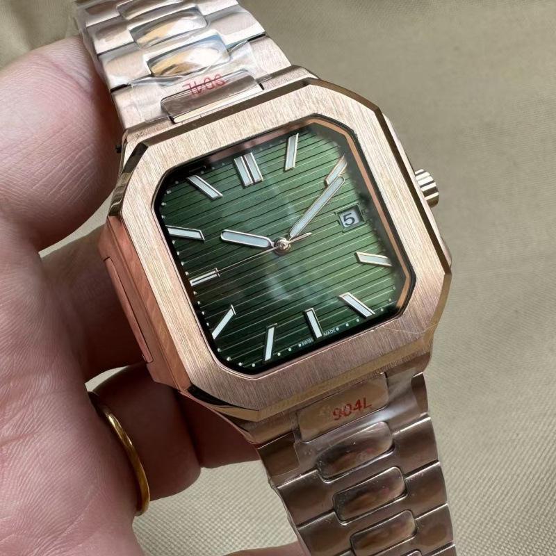 Patek Philippe Nautilus 5821 Men's Gold Automatic Mechanical Watch with Large Dial and Calendar.