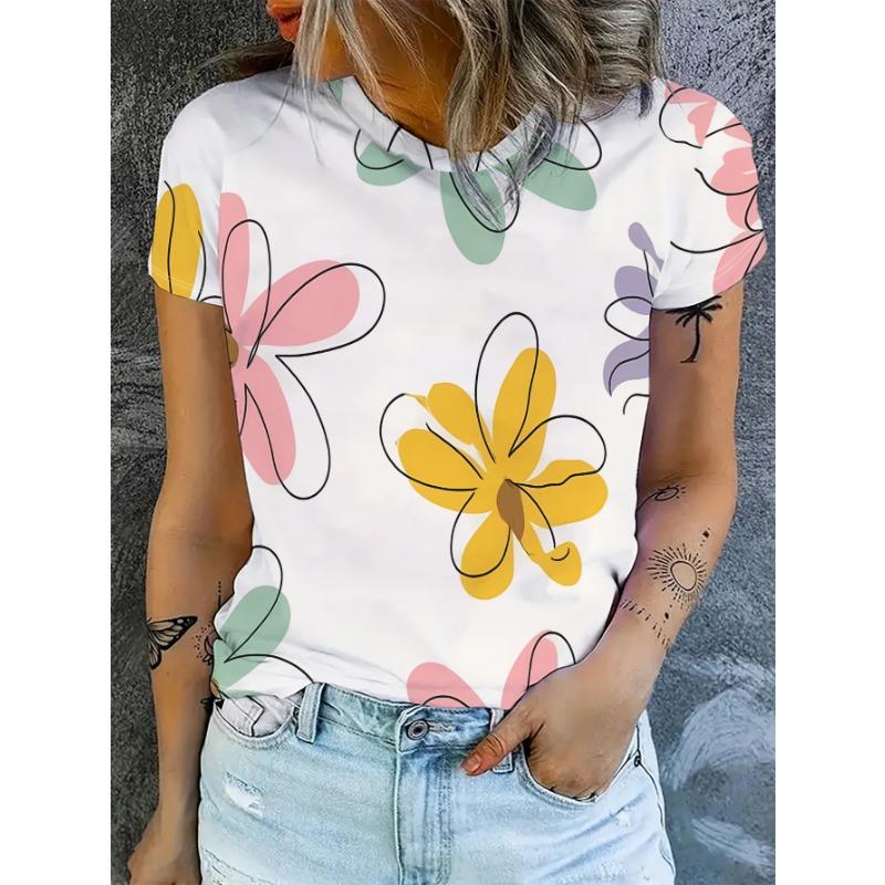 

A short-sleeved women s T-shirt with a bright floral print, paired with light-colored jeans L