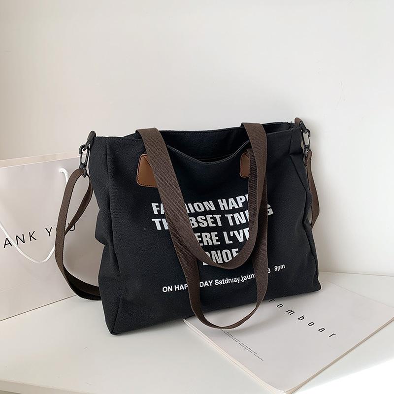 Simple canvas large-capacity casual bag women's 2025 new lazy style single shoulder fashion printed letter tote bag
