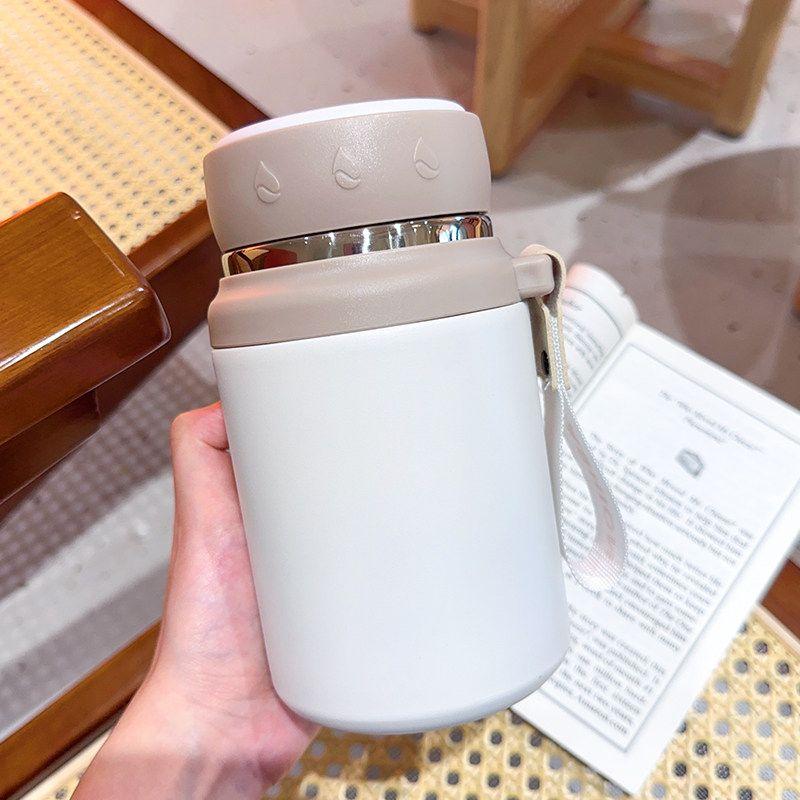 

Business-Style Simple Large-Capacity Thermos Cup for Men and Women with Tea Compartment, 316 Stainless Steel Tea Brewing Cup, Portable for Sports White 750ml